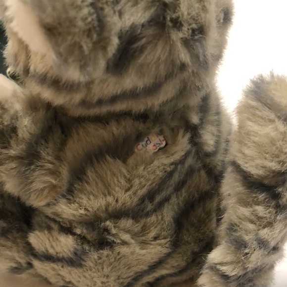 Geppeddo porcelain doll with a cat outfit that is striped and sage bow with bell - Picture 3 of 8